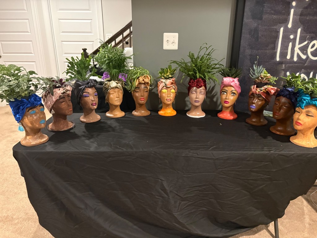 Completed face planters displayed after the workshop